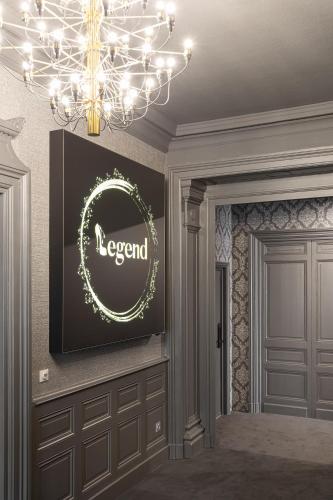 a rendering of a room with a legend sign on the wall at Legend Majestic - Parking Privé GRATUIT- Climatisation - Gare - Centre Ville - FIBRE in Mâcon