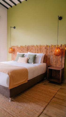Tukki Ecolodge Hotelにあるベッド