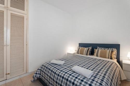 Кровать или кровати в номере Apartamentos Playa Azul - 10