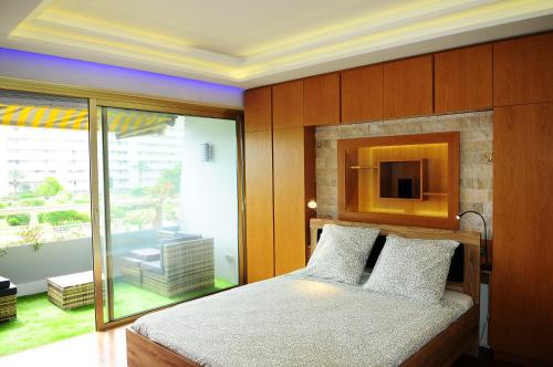 Ένα ή περισσότερα κρεβάτια σε δωμάτιο στο Marina Beach