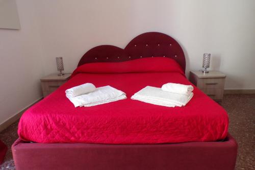 Postel nebo postele na pokoji v ubytování NUOVA AURORA Rent Rooms