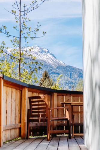 a balcony with a view of a snow covered mountain at Silberleithen Estate in Biberwier