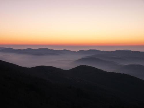a view of the mountains at sunset at Villa hameau paisible Ardouane, à côté voie verte in Riols