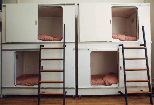 a group of bunk beds in a room at STAY OPEN Venice Beach in Los Angeles