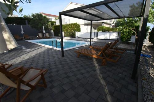 Kolam renang di atau dekat dengan Luxury Escape with Swimming Pool & Modern Design