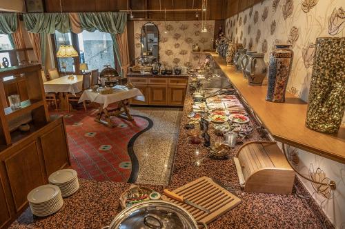 Ein Sitzbereich in der Unterkunft Sporthotel Göbel Garni