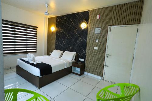 Postel nebo postele na pokoji v ubytování D-Green Hotels