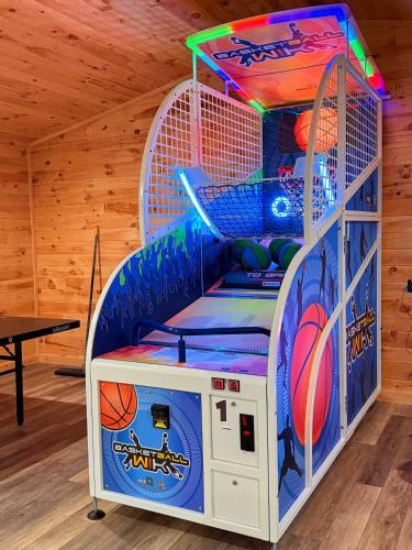 a bunk bed in a room with a basketball hoop at Pop up Camper Site Water & Electric Up to 32FT Site ONLY in Gaines