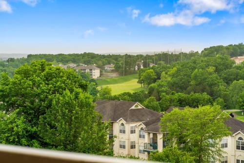 a view of a residential neighborhood with houses and trees at Golf Course View at the Foothills Resort in Branson