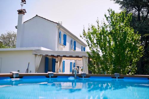 Foto Cà del Mar rustico a Jesolo con giardino e piscina privati ad uso esclusivo # 1