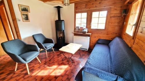 Un lugar para sentarse en Chalet Le Recoulet 8 personnes - Evolene