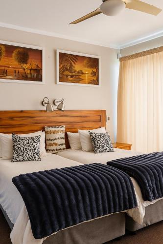 Ένα ή περισσότερα κρεβάτια σε δωμάτιο στο Lagoon Step Self catering Unit
