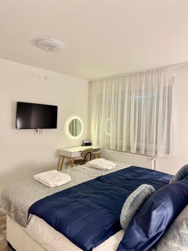 Katil atau katil-katil dalam bilik di Natura Lux Holiday House with Pool and Jacuzzi