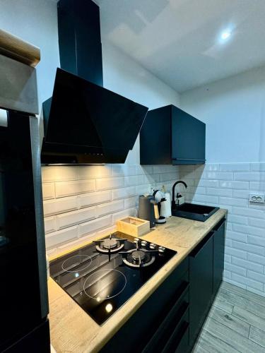Dapur atau dapur kecil di Natura Lux Holiday House with Pool and Jacuzzi