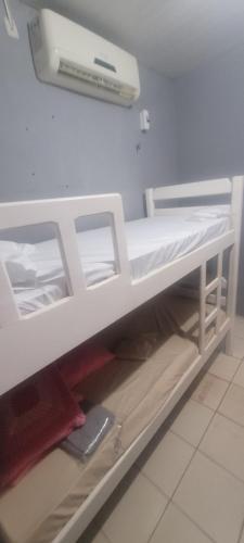 Postel nebo postele na pokoji v ubytování Toca dos Gatos