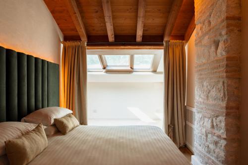 Postel nebo postele na pokoji v ubytování Pavillon Apartments