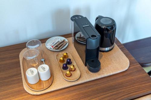 a wii remote sitting on top of a table at Petradi Studios & Villa in Aegiali