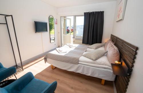 Postel nebo postele na pokoji v ubytování Hotel Falken