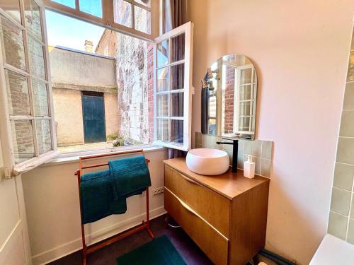 Φωτογραφία από το άλμπουμ του Loft T2 avec terrasse sur la Grand Place d'Arras σε Arras
