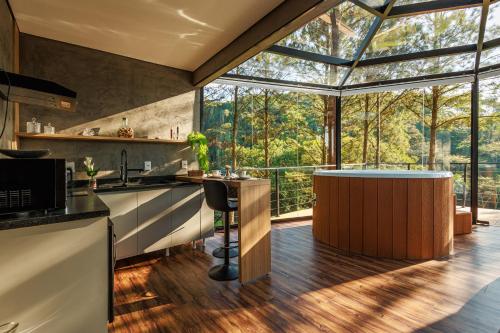 Nhà bếp/bếp nhỏ tại Maravilhosa Cabana de Vidro de Luxo na Natureza