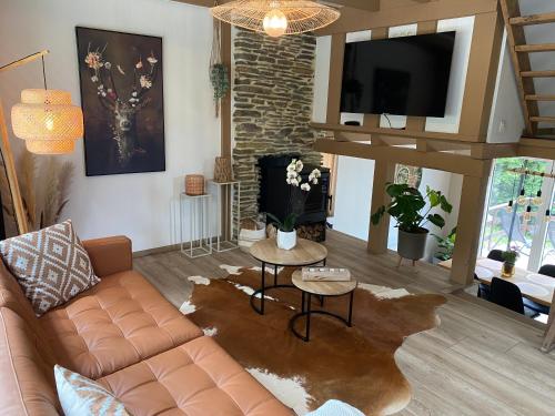 TV a/nebo společenská místnost v ubytování Romantik Wood