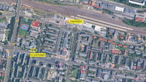 a map of a city with a yellow intersection at PRADA Apartament Konin in Konin