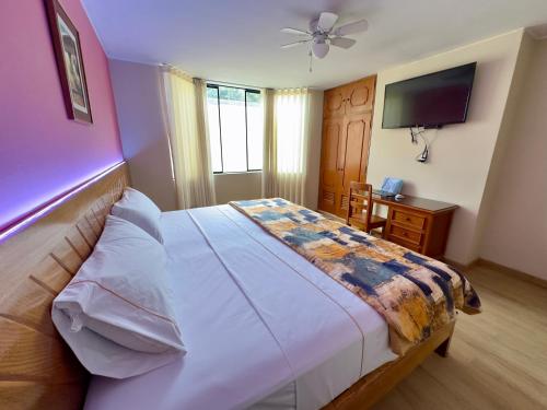 Ένα ή περισσότερα κρεβάτια σε δωμάτιο στο Hotel La Molina