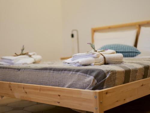 Ένα ή περισσότερα κρεβάτια σε δωμάτιο στο Yurta Glamping San Leone & Casa Vacanza Baia Blu