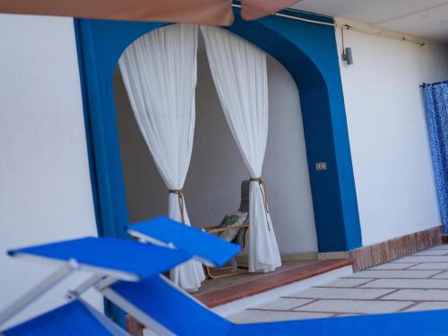 Ένα ή περισσότερα κρεβάτια σε δωμάτιο στο Yurta Glamping San Leone & Casa Vacanza Baia Blu
