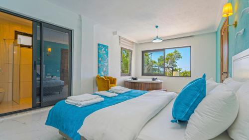 Postel nebo postele na pokoji v ubytování Eco Villa Tamarra