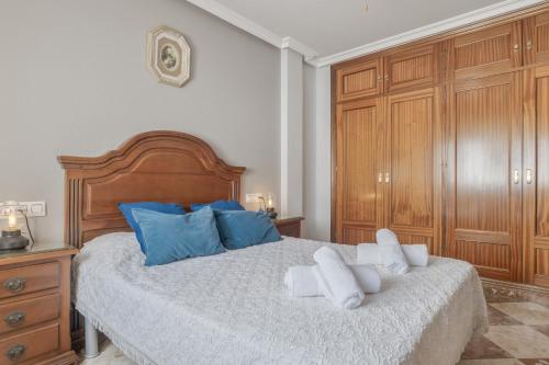Ένα ή περισσότερα κρεβάτια σε δωμάτιο στο Atico Rota Centro