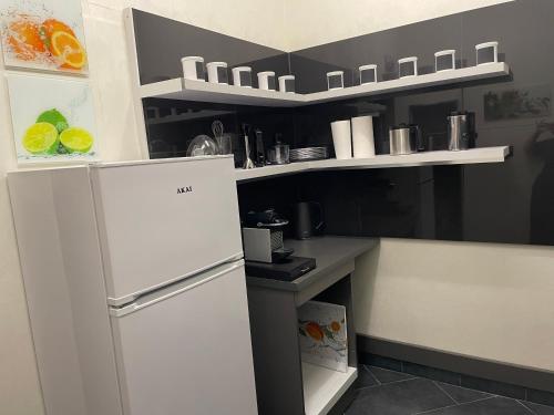 Kuchyň nebo kuchyňský kout v ubytování Casa Melarosa