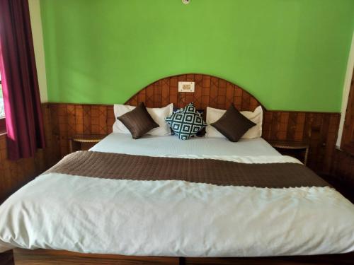 Postel nebo postele na pokoji v ubytování Joeys Hostel Manali