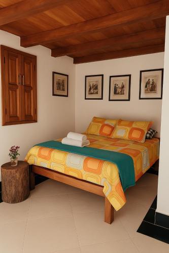 Una cama o camas en una habitación de La Ramada