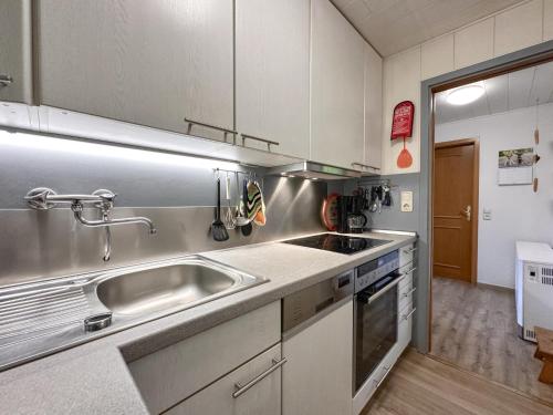 a kitchen with a sink and a counter top at Haus Anna in Stadlern