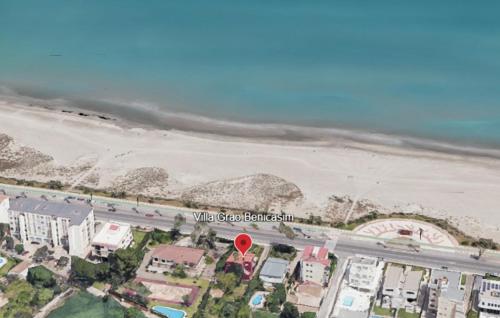an overhead view of a beach with a red stop sign at Villa Grao Benicasim REF 026 in Grao de Castellón