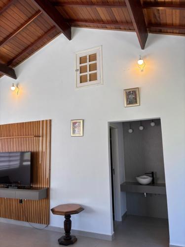 Μια τηλεόραση ή/και κέντρο ψυχαγωγίας στο Pousada Lambari Montanha Hotel