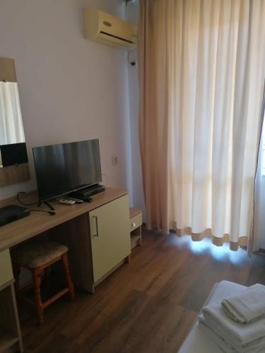 Μια τηλεόραση ή/και κέντρο ψυχαγωγίας στο Manolovi Guest House
