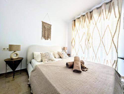 En eller flere senge i et værelse på Paraiso Estepona Martinez