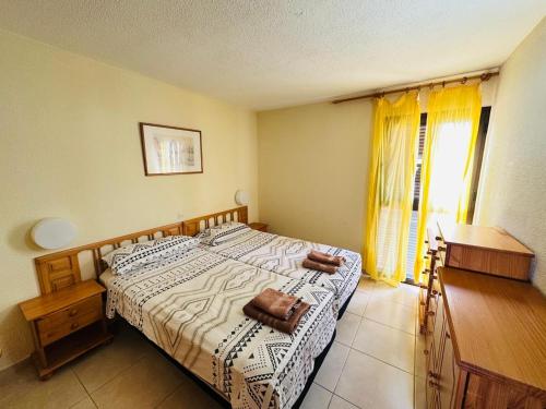 Ένα ή περισσότερα κρεβάτια σε δωμάτιο στο Apartamento en Sur y sol Los Cristianos