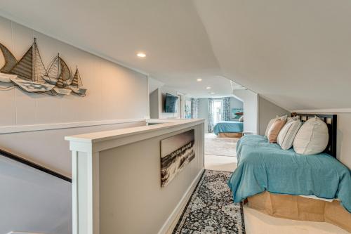 a living room with a bed and a fireplace at Canal-Front St Clair Shores Home 2 Mi to Dtwn in St. Clair Shores