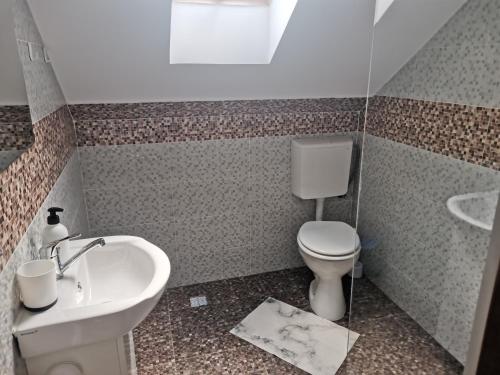 Koupelna v ubytování Guesthouse