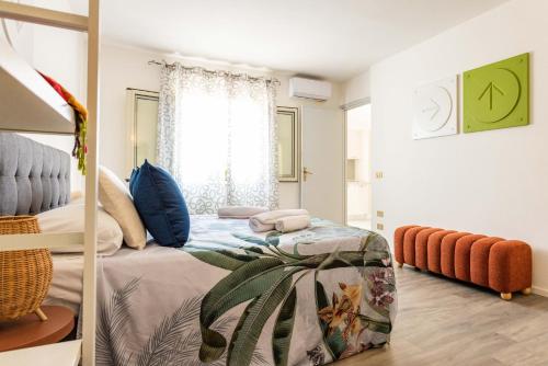 Giường trong phòng chung tại Terrazza Massimo UP