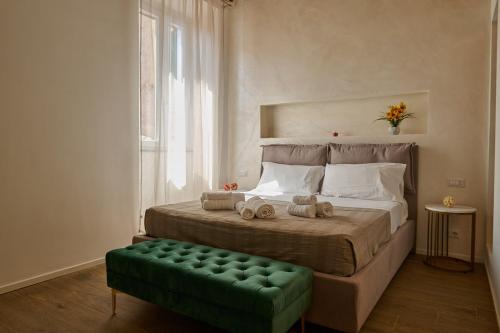 Postel nebo postele na pokoji v ubytování BellaRoma NAVONA Guest house