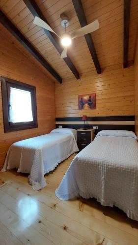 Postel nebo postele na pokoji v ubytování Apartamentos Cobres Rural