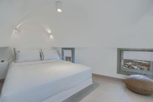 Cama o camas de una habitación en SantoView Suites