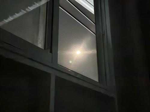 a close up of a window with a view at 29 Palms Thailand in Ban Klang