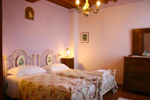 Krevet ili kreveti u jedinici u objektu Villa Arcobaleno