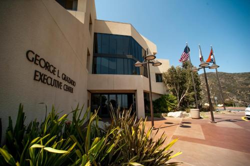 a building with an american flag in front of it at Villa Graziadio Executive Center at Pepperdine University in Malibu