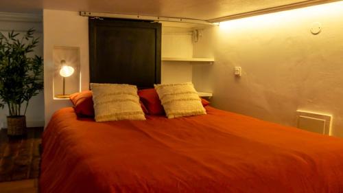 Postel nebo postele na pokoji v ubytování Studio Cozy en plein centre ville